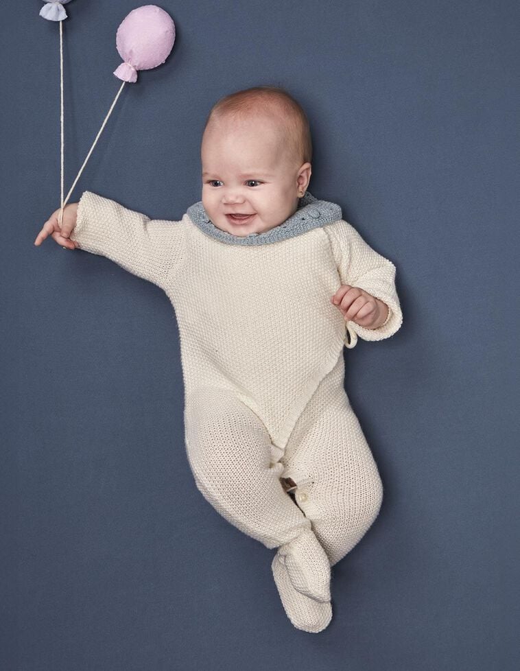 Macacão de malha em malha de arroz com lã branca