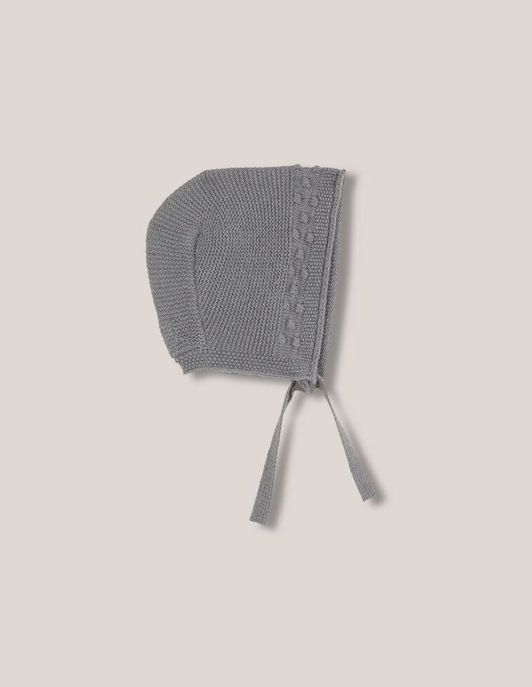 Capuz com lã com detalhes em malha de arroz e pompons verde escuro