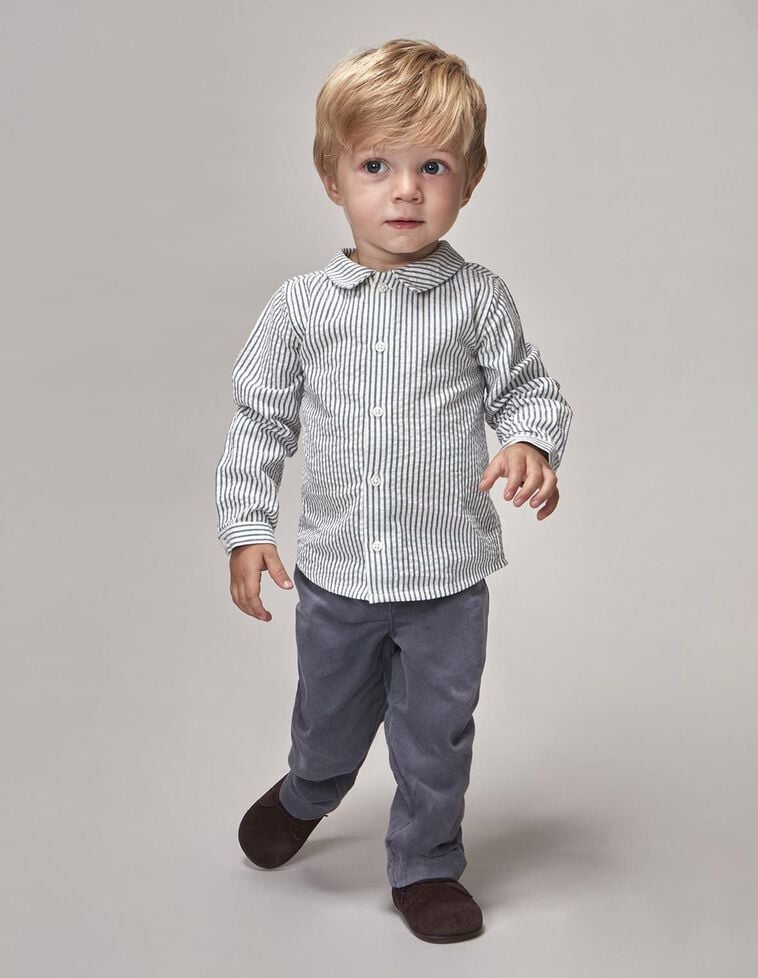 Camisa às riscas azul claro