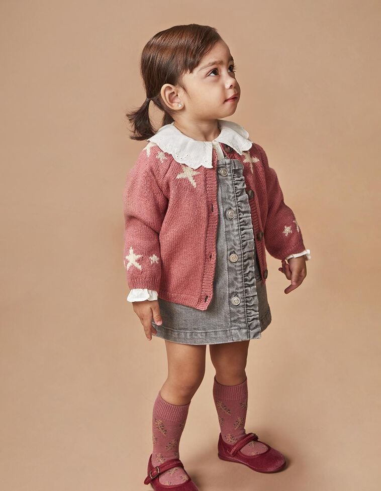 Casaco com estrelas vermelho